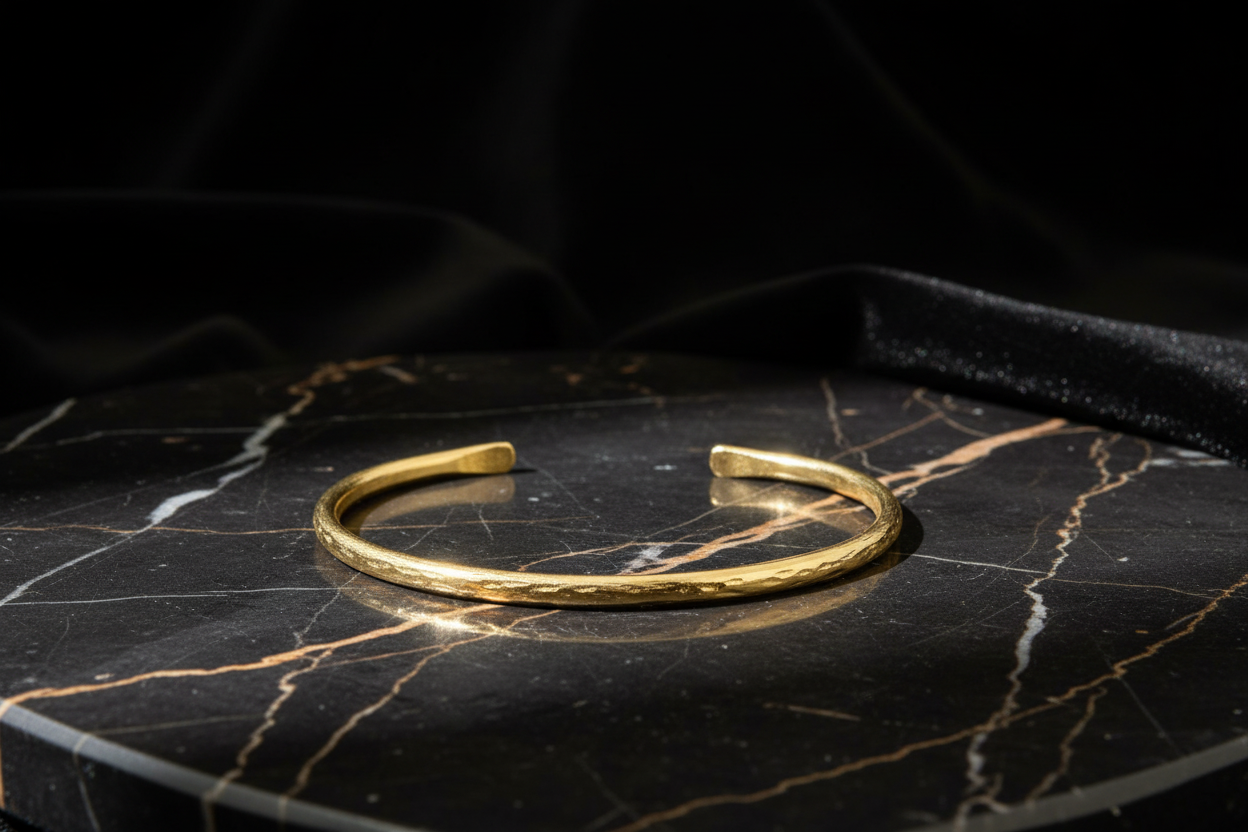 Gold cuff bracelet as one piece