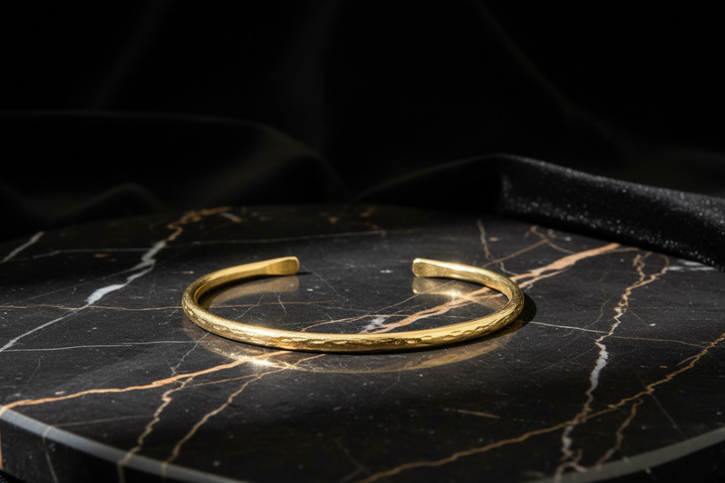 Gold cuff bracelet as one piece