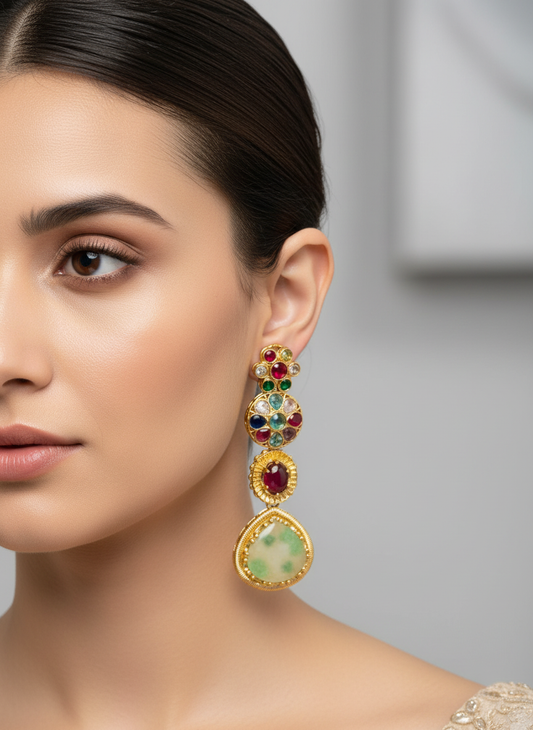 Model wearing multi-gemstone chandelier earrings