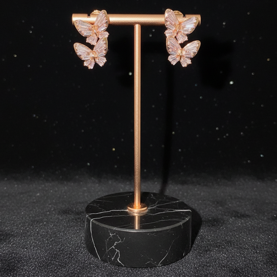 Pink crystal butterfly earrings on new holder