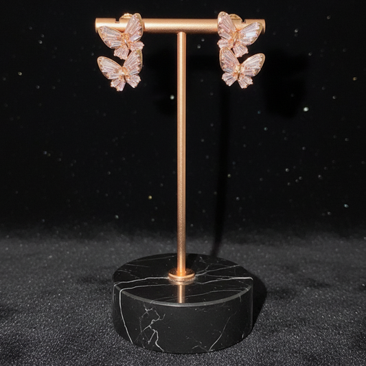 Pink crystal butterfly earrings on new holder