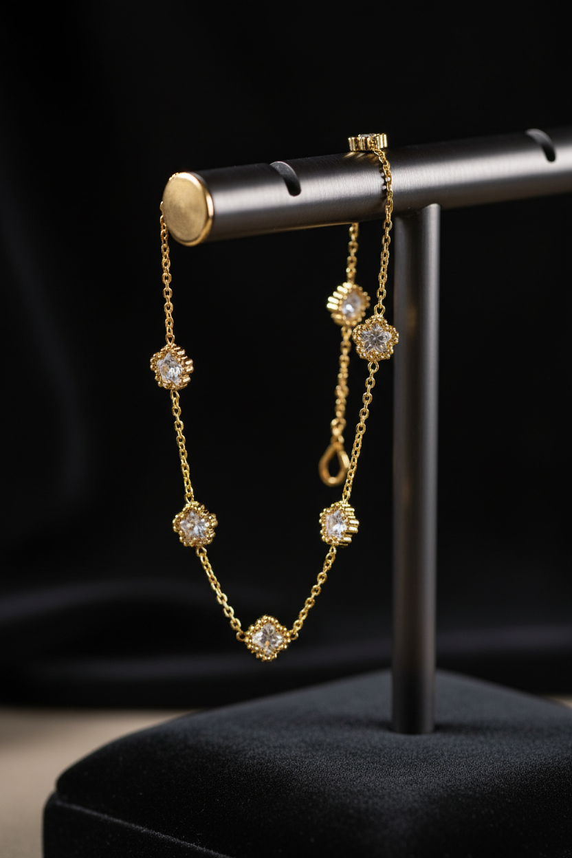 Quatrefoil clover charm anklet on display