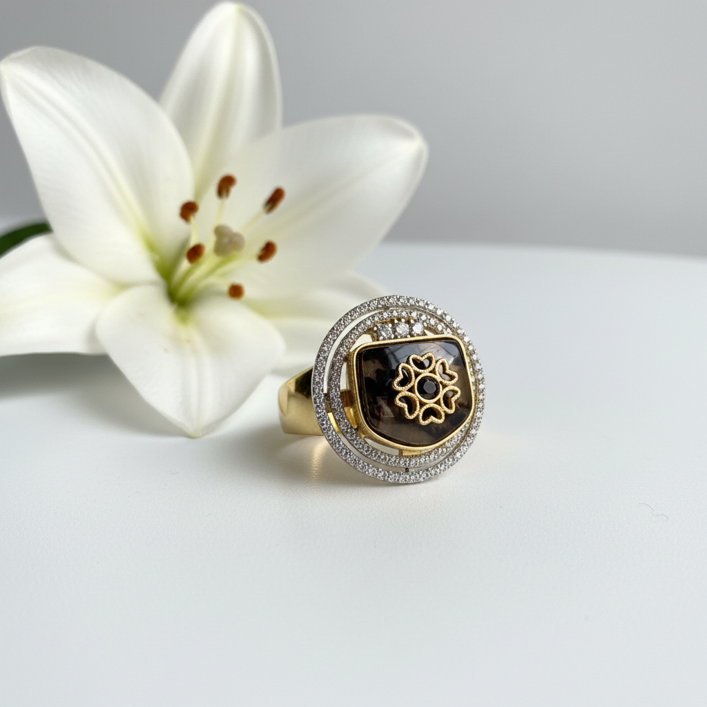 Ring with dark stone and lily