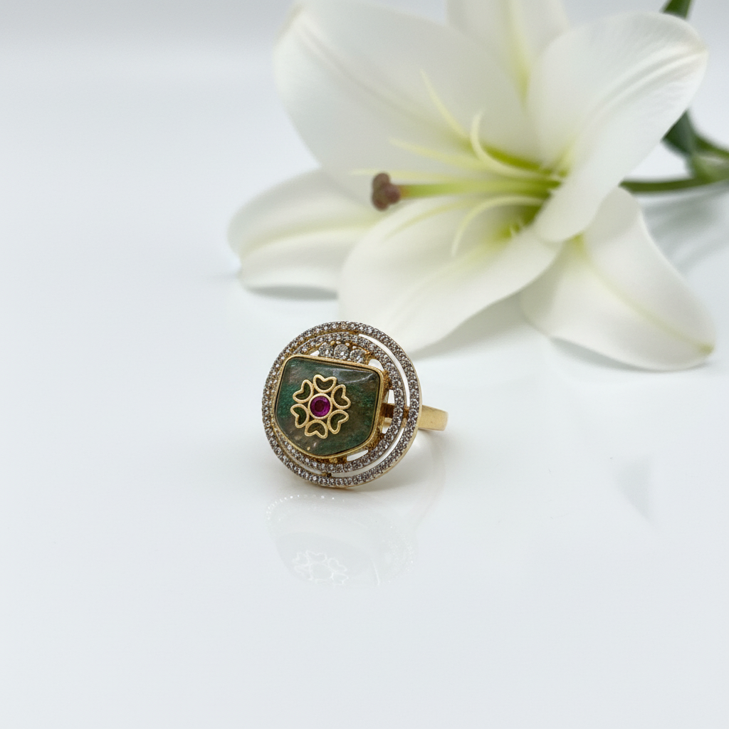 Ring with green stone and lily