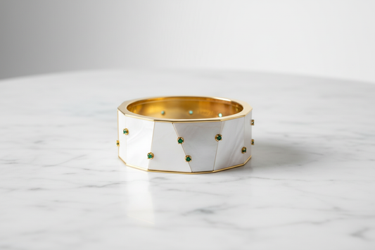White enamel bangle with emeralds